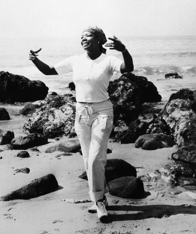 San Francisco, California, USA --- Poet Maya Angelou walks along the beach in San Francisco. --- Image by © Bettmann/CORBIS